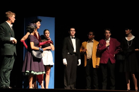 Students on stage for a play