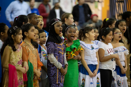 A line of students performing a cultural song during the 2019 International Night