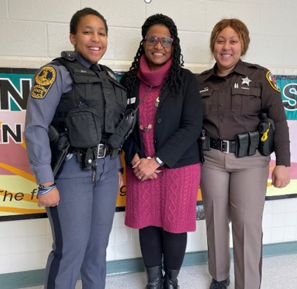 Karen with Law Enforcement Officers at Hunter Woods Career Day