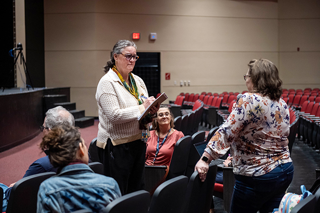 Dr. Reid taking notes