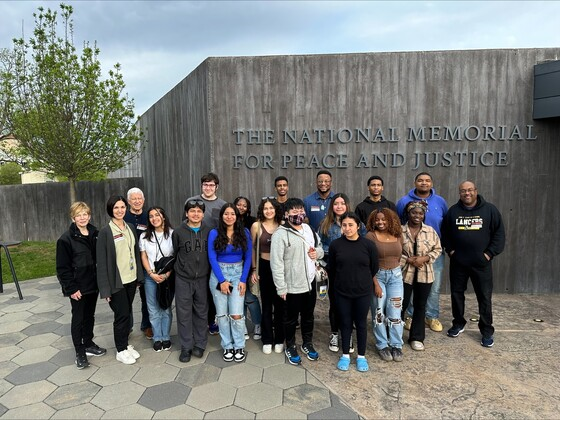 Lewis High School Leadership Program students and staff in front of The National Memorial for Peace and Justice