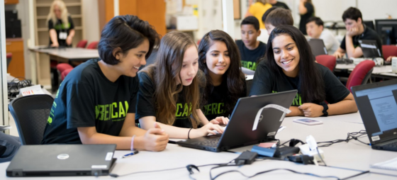 students working at laptop