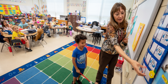 Teacher with student