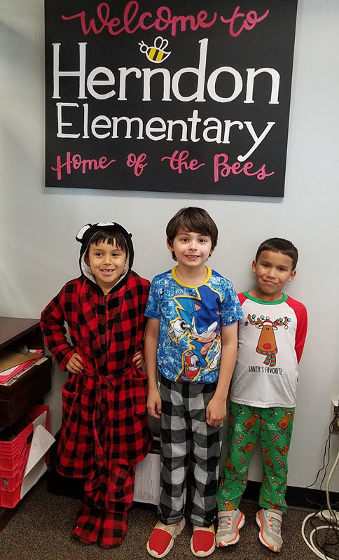kids dressed in pajamas for pajama day