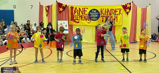 Students juggling scarves