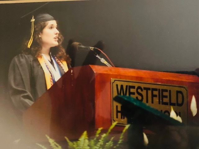 student speaks at podium