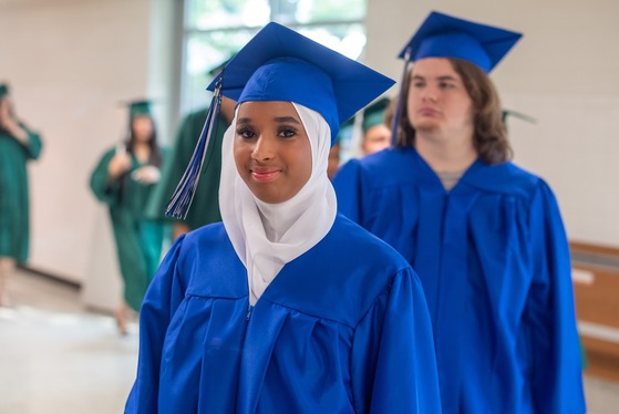 student in graduation cap and gown