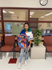 Lucy and her backpack