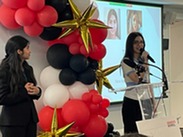 Two FCPS students speaking before the Genesys Works signing day crown in Washington D.C.