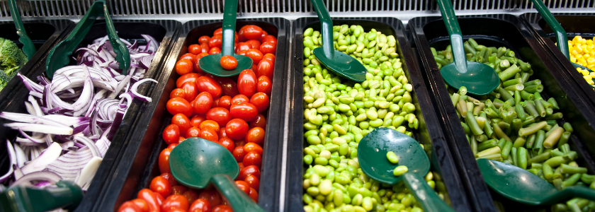 photo of colorful vegetables at a salad bar