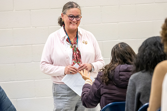 Superintendent Dr. Michelle Reid speaking with parents
