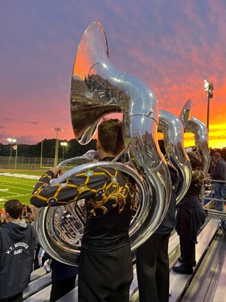 Band performing in the sunset