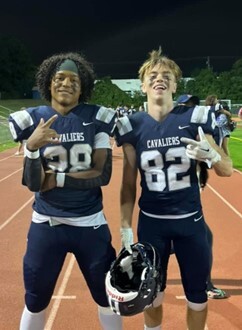 Go Cavs! Football Athletes Celebrating