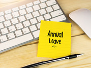 Annual Leave written on sticky note