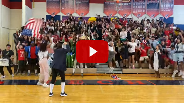 Screenshot of TJ Homecoming Highlights Youtube video with play button icon on it