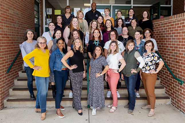 The Department of Hearing and Vision pose for a photo