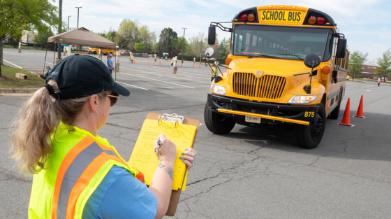 bus driver driving through obstacle course