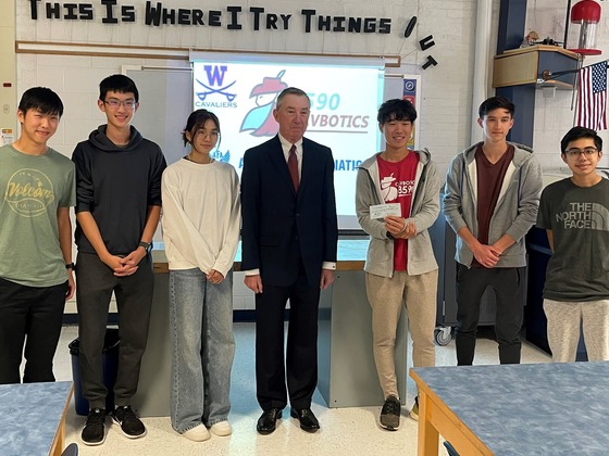 Air Force Association presents Cavbotics with check