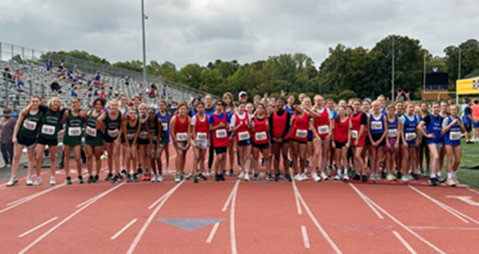Middle School cross country runners at starting line