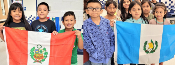 Elementary students holding flags from Hispanic and Latin American countries