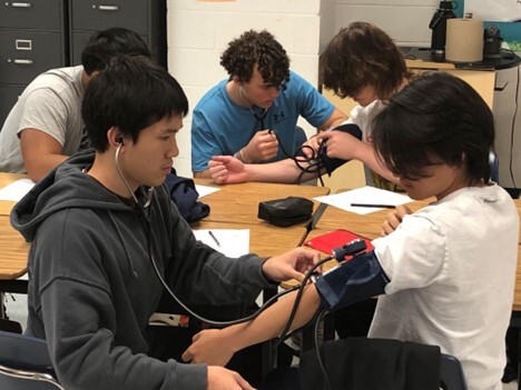 Sports Medicine Class Doing a Blood Pressure Lesson