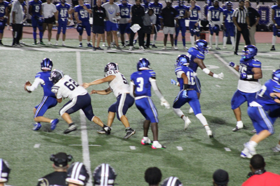 Woodson’s Rafael Pena sacking West Potomac’s QB