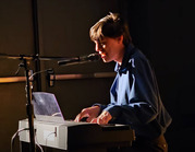 Davis Center student Christian performing on piano