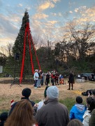 Students perform at last year's tree lighting