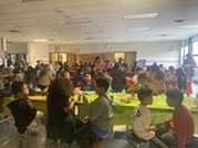 Families enjoying Thanksgiving Lunch