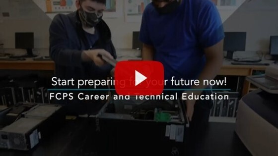 Student taking apart computer