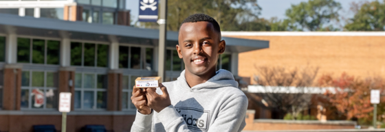 Student holding bar of soap
