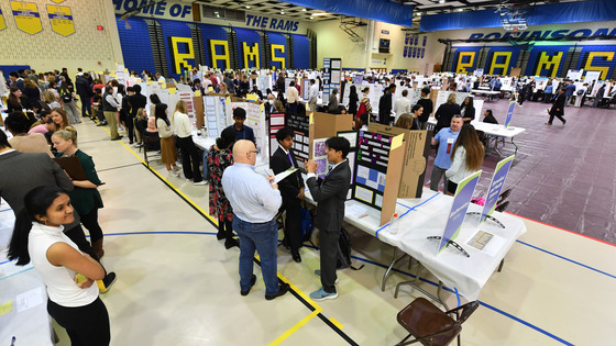 Robinson Secondary School's gym filled with students and judges at the science fair