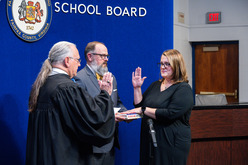 New Springfield District School Board Member, Sandy Anderson, being sworn in.