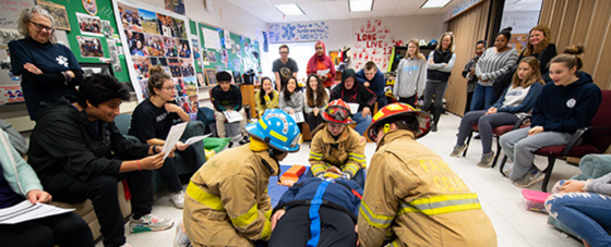 FCPS Fire Academy students give demonstration in front of other students