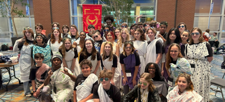 FCPS Latin students standing and kneeling in group