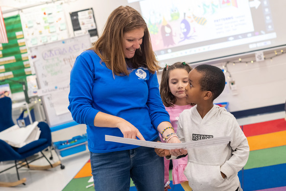 First grade teacher Briana Trone works with math patterns with her students at Wakefield Forest Elementary School.