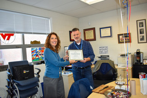 Chuck Lord winning Outstanding School-Based Professional Employee