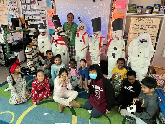 class dressed as snowmen