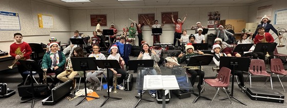 Band students preparing for their holiday concert