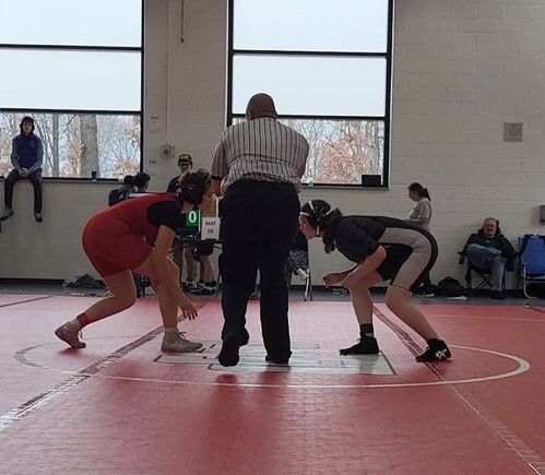 Serena Mancuso (right) representing Woodson in the Girls Wrestling Tourney