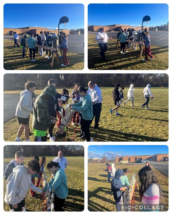 Collage of five pictures showing groups of students setting up rockets to take off on the field outside of the school building.