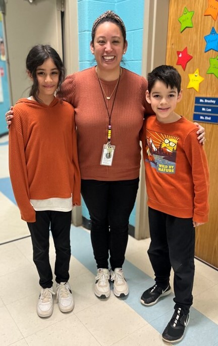 It's triplets! Mrs. Keener and two of her students matched outfits today. 