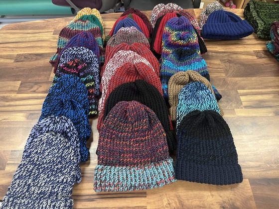 Library Service Learning project of making hats and scarves