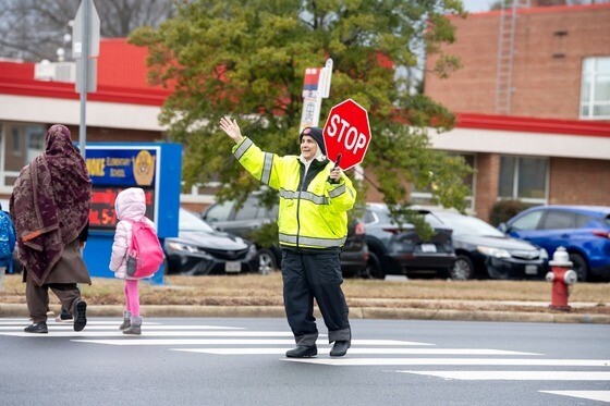 Crossing guard in front of our school