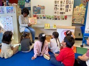 Rotary member reads to students