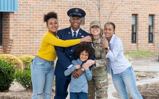 Military family posing for a photo