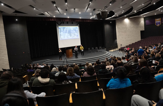 Community members attending a community conversation about the dangers of fentanyl and other drugs in the theater at Lake Braddock Secondary School.