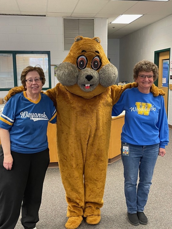 Librarians with Woody the Woodchuck