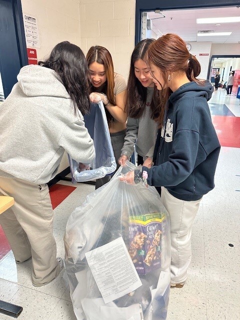 Science National Honor Society recycling as part of Woodson's Get2Green initiative