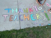 "Thank You Teachers!" written in sidewalk chalk.